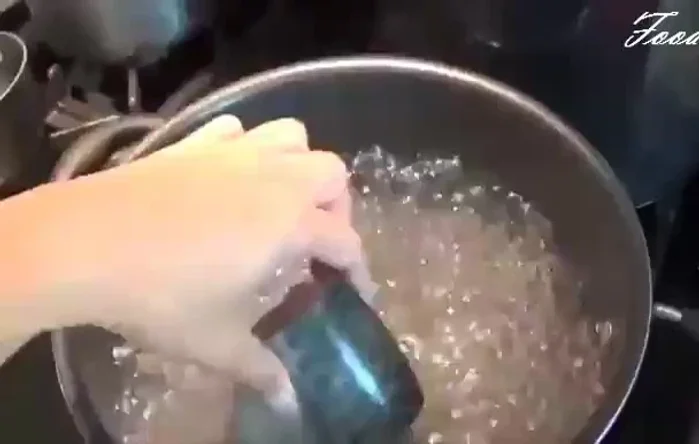 Once boiling, add the fish (cut into four quarters).