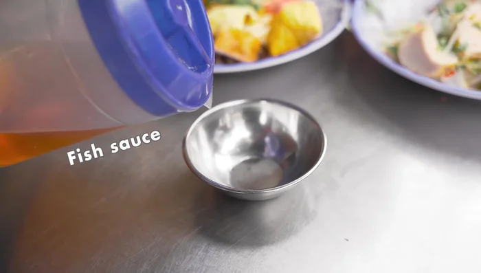 Serve with a diluted fish sauce (adjust with sugar and water as needed). Add chili as desired.