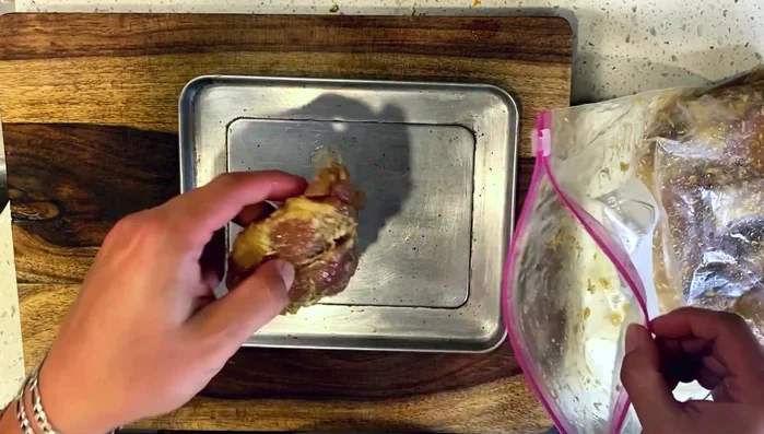 Sear the chicken: Remove large lemongrass pieces from the marinated chicken. Heat peanut oil in a wok. Sear chicken thighs until fully cooked (165°F internal temperature). Let rest for 5 minutes before slicing.