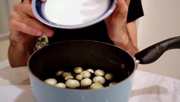 Place the eggplants in a pot of salt water and let them sit for 15 minutes.