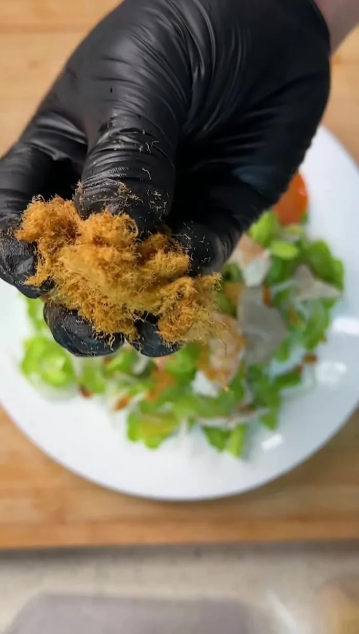 Serve on a plate, topping with pork floss and fried shallots or toasted peanuts (optional).
