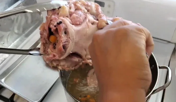 Remove the meat from the pot and let it cool.