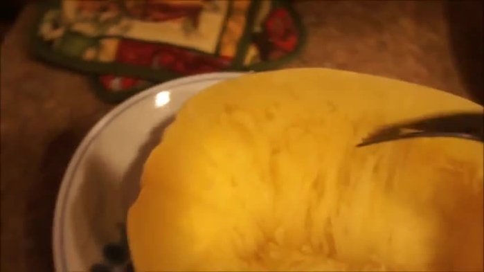 Once the squash is soft, use a fork to separate the flesh into strands.