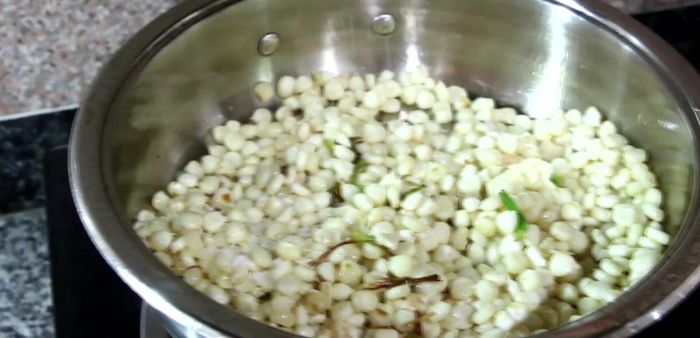 Add salt, sugar, and chicken stock to taste. If using frozen corn, it will release liquid; if using fresh Vietnamese corn (lighter in color and more glutenous), add 2-3 tablespoons of water.
