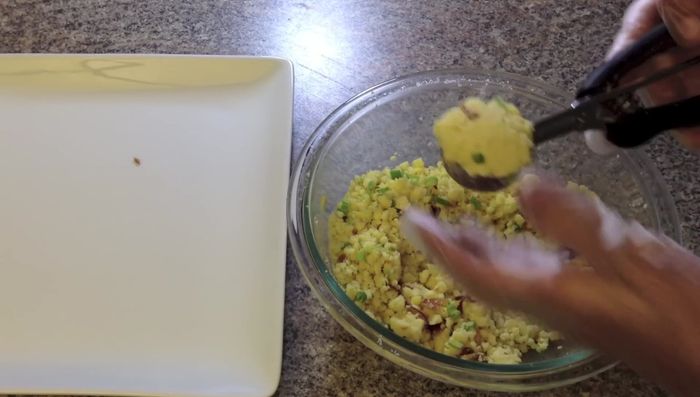 Using a small ice cream scoop, scoop the mung bean mixture into round balls.