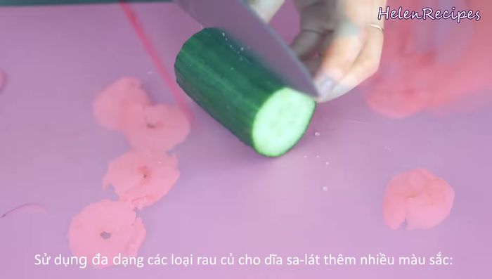 Cut cucumber in half lengthwise, remove the core, and slice into strips.