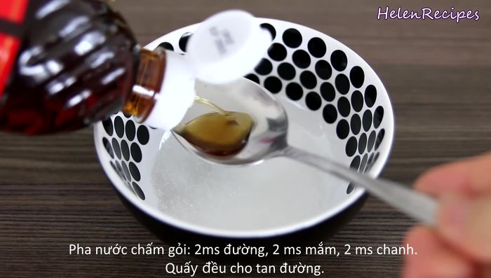 Make the dressing: combine equal amounts of sugar, fish sauce, and lime juice (2 tbsp each). Stir well to dissolve the sugar.