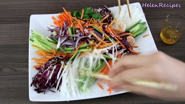 Serve: Pour the dressing over the salad and mix well with chopsticks. Add sesame peanuts or prawn cracker chips for added texture and flavor.