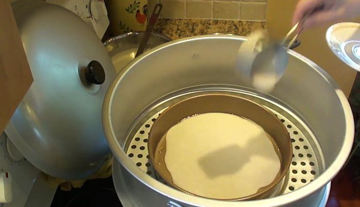 Add a little more than half a cup of the taro mixture to the pan and steam for 5 minutes. Then add half a cup of the coconut mixture, steam for another 5 minutes. Repeat layering, alternating between taro and coconut mixtures until all batter is used.