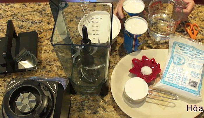 In a blender, combine coconut milk, water, and the remaining sugar (except for the 1/4 cup reserved earlier).