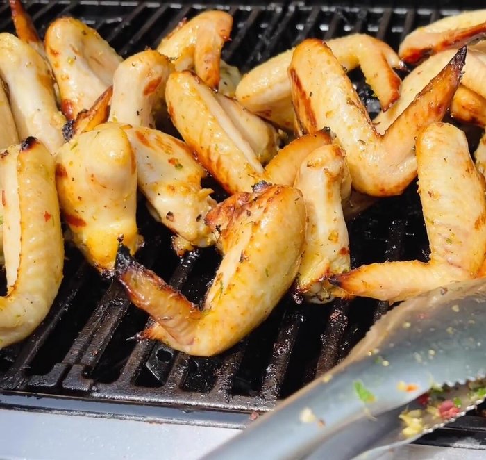 Tip: To ensure even cooking, especially of thicker wing parts, position the wings so the thicker sections are directly over the heat towards the end of the cooking process.