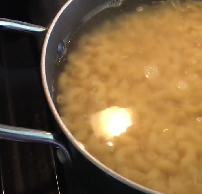 Drain noodles and rinse under cold water to stop the cooking process.