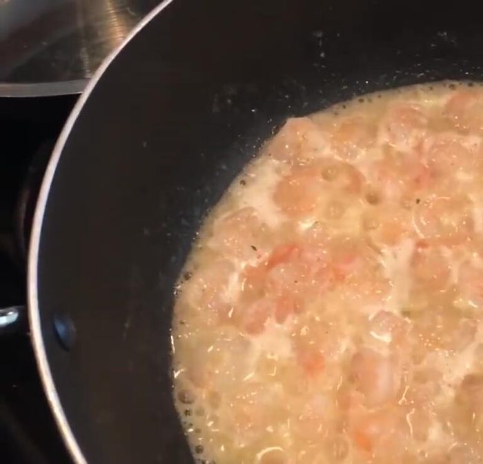 Add cooked noodles to the skillet. Mix well.