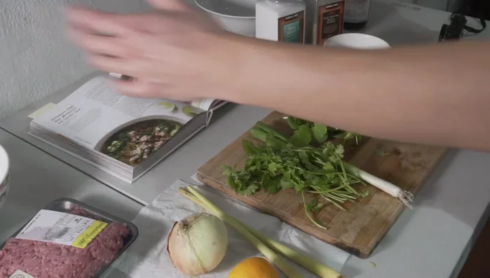Prepare the cilantro, green onions, and watercress by washing and chopping them into bite-sized pieces. Set aside.