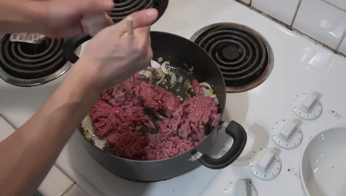 Cook the beef until fully cooked (no pink remaining).