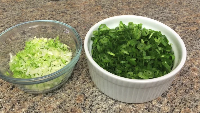 Chop the green onion; separate white and green parts into separate bowls.