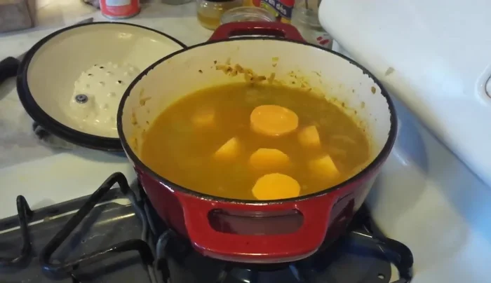 Add sweet potatoes and the seared chicken to the soup.