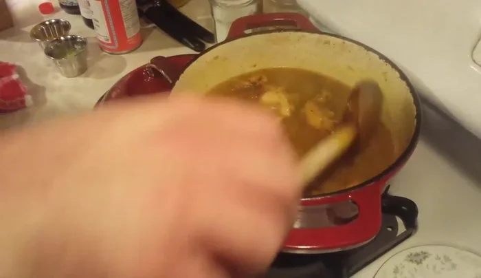 Simmer until chicken is cooked through (about a couple of hours).