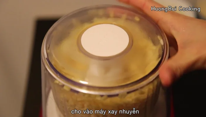 Add the steamed mung beans to a food processor and grind until powdery.