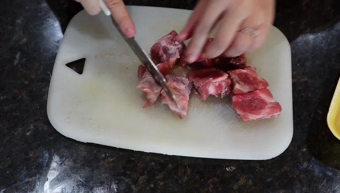 Add the pork spareribs to the boiling water.