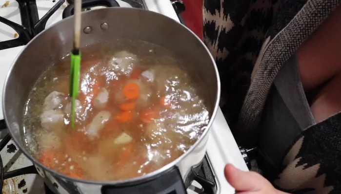 Mix everything well, cover the pot, and let it cook on medium heat until the carrots and potatoes are tender.