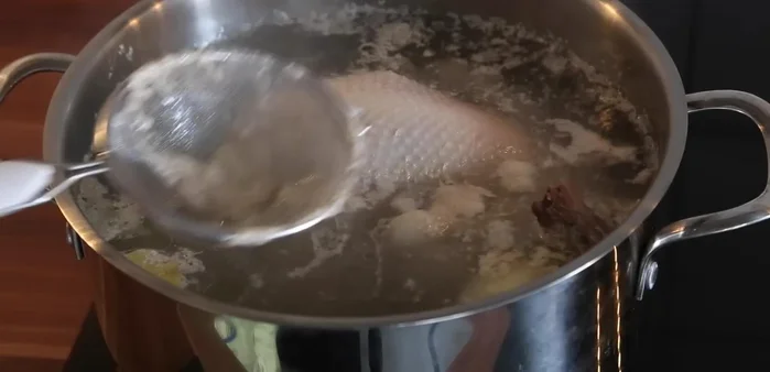 Add salt and simmer until chicken is cooked through.