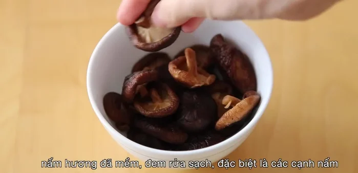 Wash and slice the softened mushrooms into thin strips.