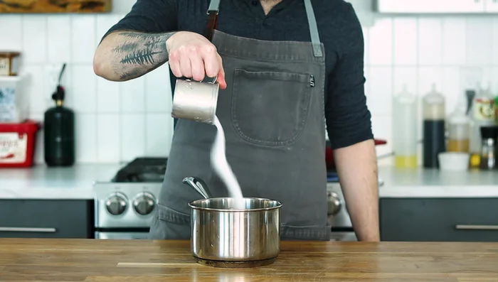 Make caramel: Add sugar to a heavy-bottomed pot over medium-low heat. Let it melt without stirring until amber brown. Add to the browned pork.