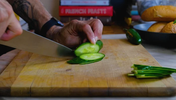 Slice cucumber and jalapeno thinly.