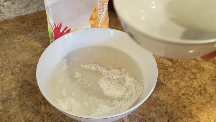 Mix tapioca starch with cold water until dissolved.