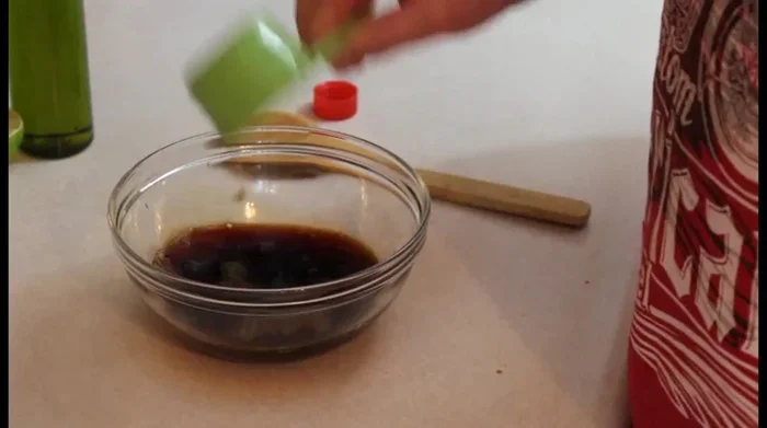 In a bowl, combine soy sauce, fish sauce, brown sugar, grated ginger, hot sauce, garlic, and lime juice.