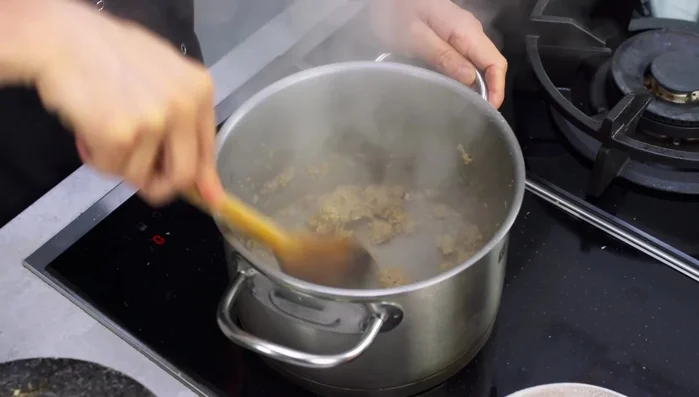 Add beef to the pot and sear until nicely browned. Add five-spice powder, cinnamon, and star anise; cook until fragrant.
