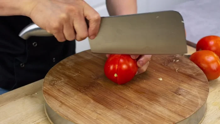 Add tomatoes and cook on high heat until they release their juices (a couple of minutes).