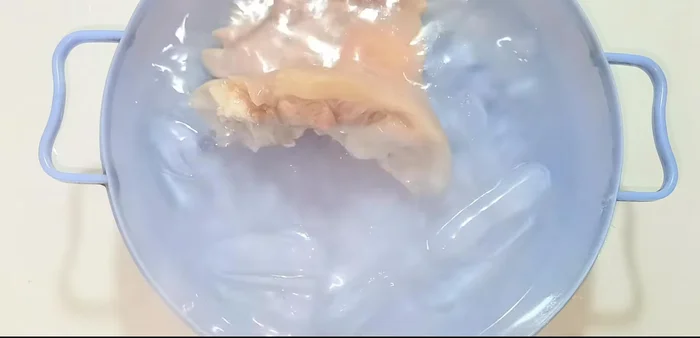 Cool and chill: Remove pig's hands and immediately submerge in ice water to make them crispier.