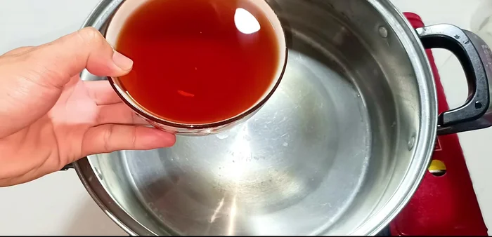 Prepare soaking liquid: In a separate pot, combine fish sauce, sugar, and rice vinegar. Bring to a boil, then remove from heat and let cool completely.