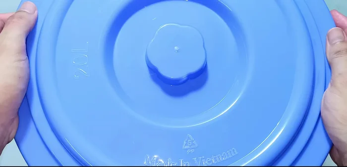 Flip and continue soaking: After a day, flip the cabbage leaves to ensure even soaking. Continue soaking for another day.