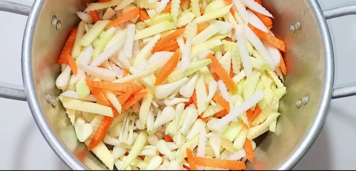 Mix all the vegetables with salt and sugar. Let it sit for 3-4 hours to release water, mixing occasionally.
