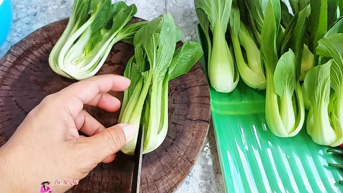 Cut the bok choy in half (or into four pieces if using larger stalks).