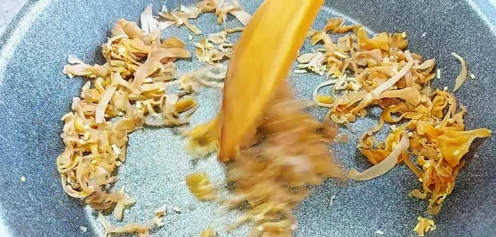Add tofu and stir-fry evenly.