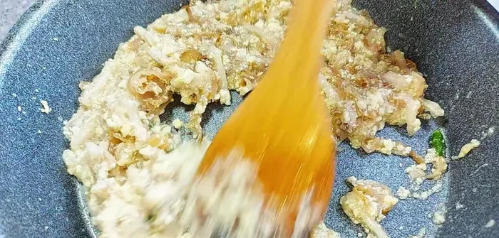 Add peppercorns, then green chili (optional, add later to prevent it from being overcooked).