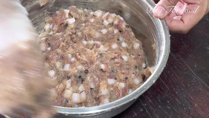 Stuff the mixture into the prepared intestines, using a sausage stuffer. Tie off sections of the sausage.
