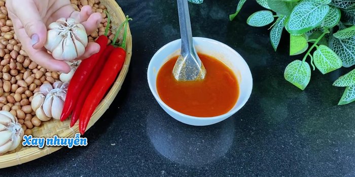 Blend garlic and chili into a paste.