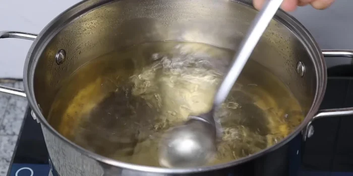 Boil the soaking water for 5 minutes after it comes to a boil. Let it cool completely.