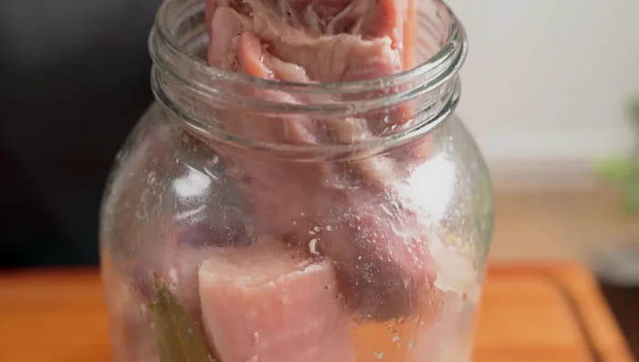 Cool and serve: Let the jars cool. Carefully remove the meat and slice thinly before serving.