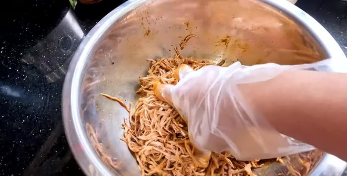 Stir-fry the beef: In a pan over low heat, stir-fry the marinated beef until most of the liquid evaporates. Add the reserved lemongrass and remaining aromatics. Continue to stir until dry.