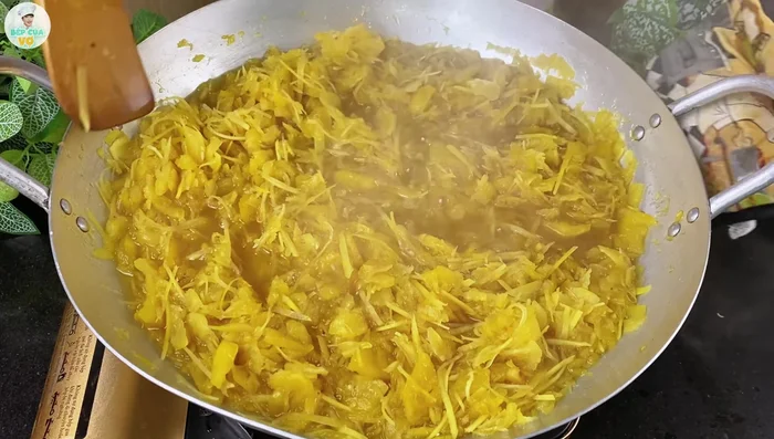 Continue cooking on low heat, stirring frequently, until the candy reaches a thick, sticky consistency. Test by dropping a small amount into cold water; it should hold its shape.