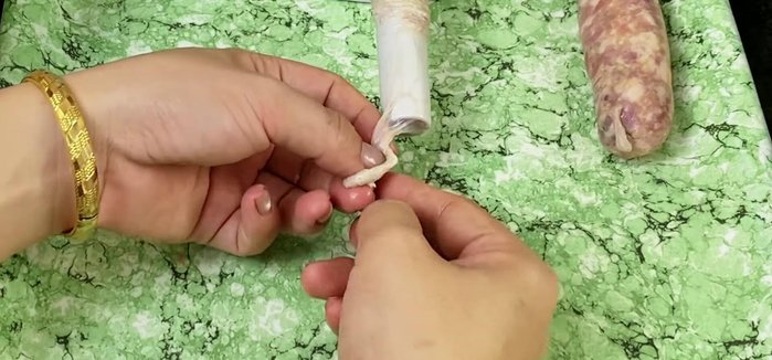 Stuff the marinated meat mixture into the sausage casings using a sausage stuffer or funnel. Tie off the ends.