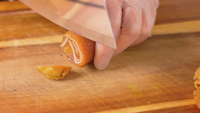 Remove from freezer, slice, and serve. Can be eaten alone or with soy sauce, rice, beer, or pickles.