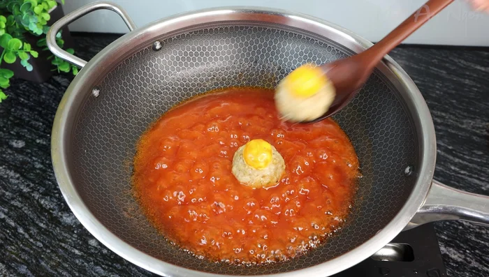 Add the steamed meatballs to the sauce and heat through.