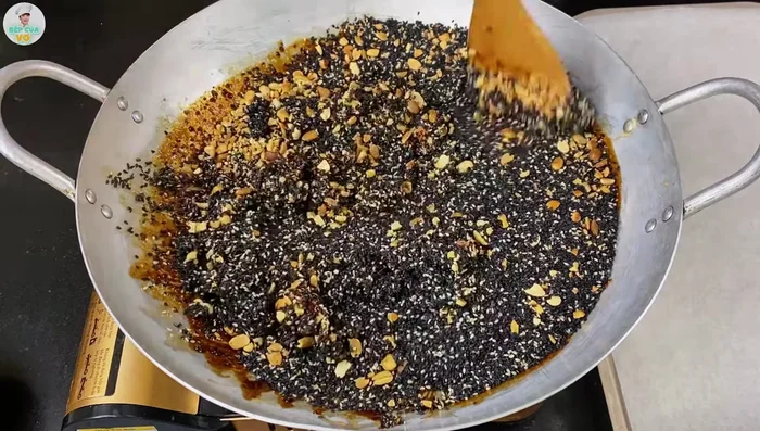 Quickly pour the mixture into a prepared mold. Cover with wax paper and press down using a rolling pin to create an even layer.